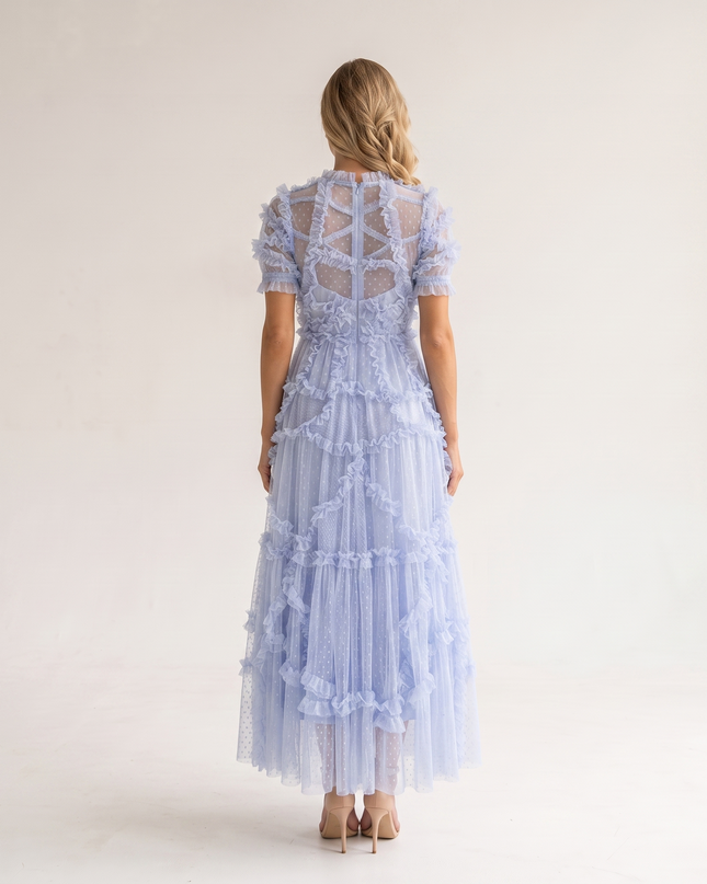 Woman wearing romantic ruffle maxi dress