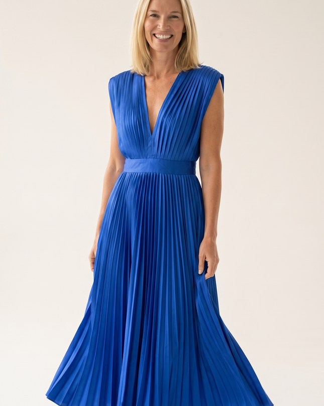 Woman wearing pleated satin midi dress