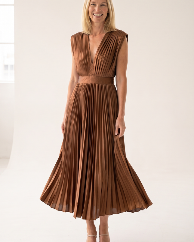 Woman wearing pleated satin midi dress