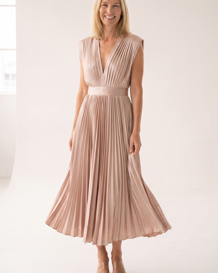 Woman wearing pleated satin midi dress