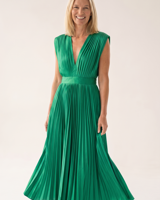 Woman wearing pleated satin midi dress