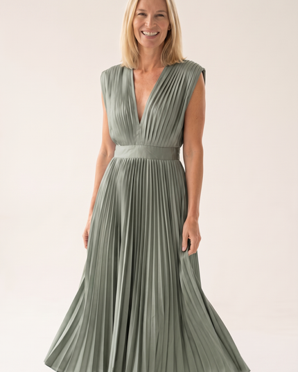Woman wearing pleated satin midi dress