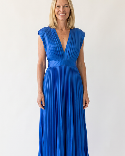 Woman wearing pleated satin midi dress