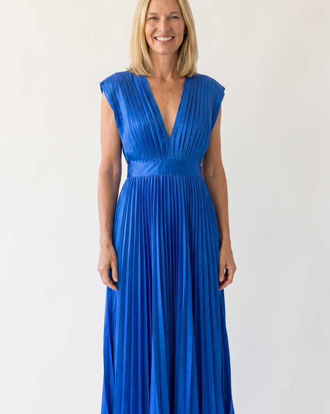 Woman wearing pleated satin midi dress