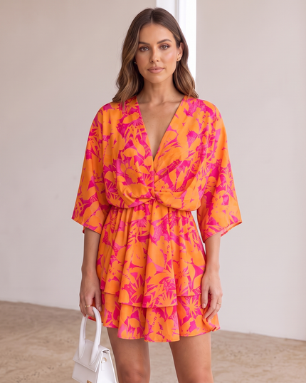 Woman wearing vibrant ruffle mini dress