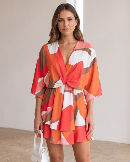Woman wearing vibrant ruffle mini dress