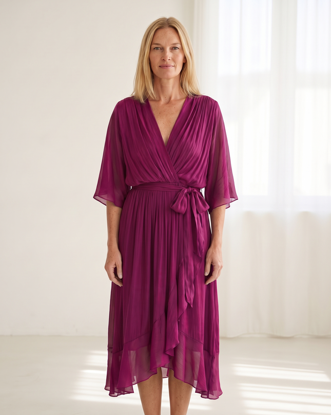 Woman wearing elegant wrap maxi dress