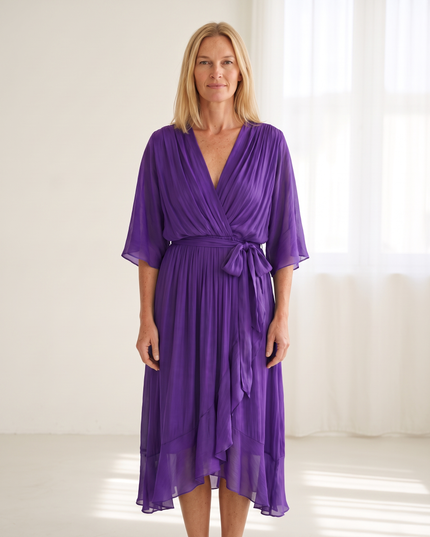 Woman wearing elegant wrap maxi dress