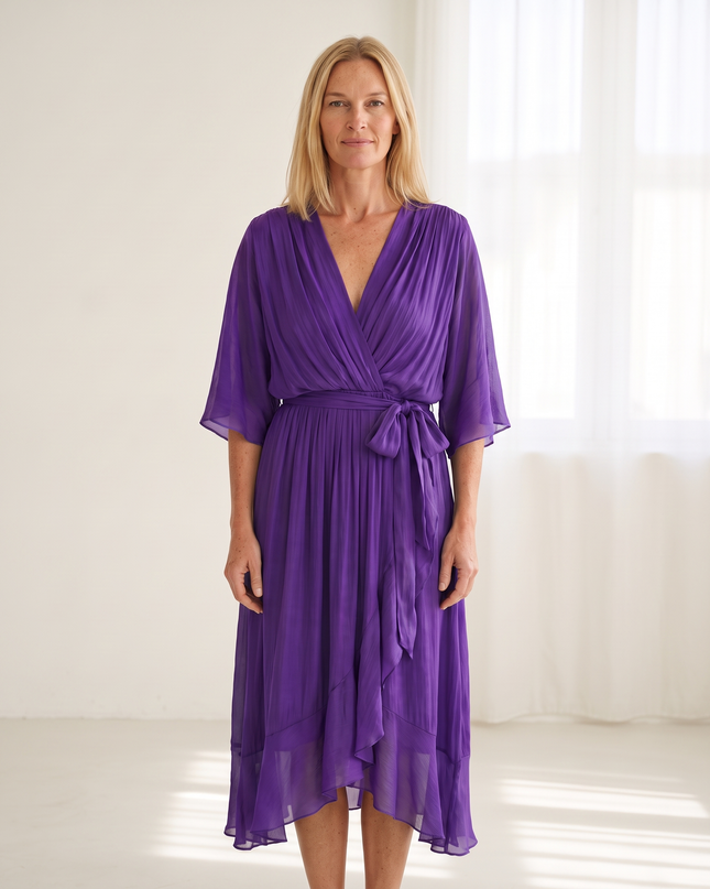 Woman wearing elegant wrap maxi dress