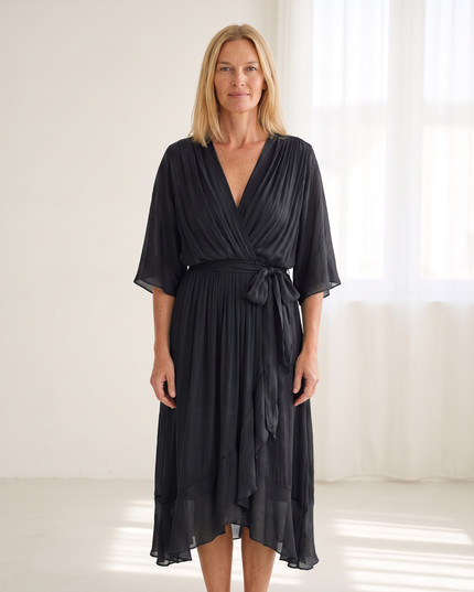 Woman wearing elegant wrap maxi dress