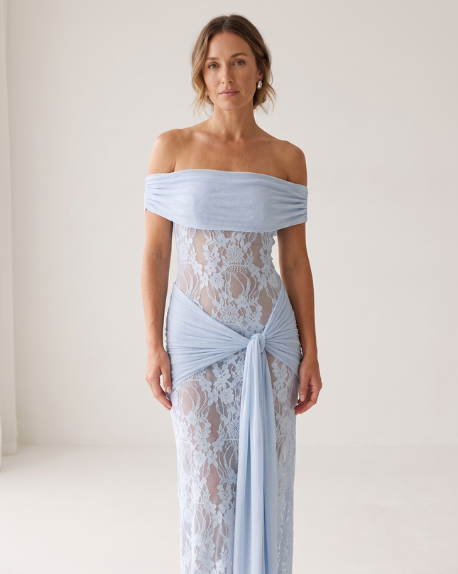 Woman wearing off-shoulder lace maxi dress