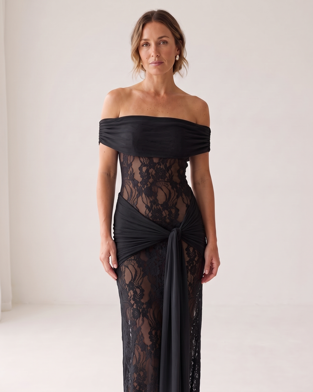 Woman wearing off-shoulder lace maxi dress