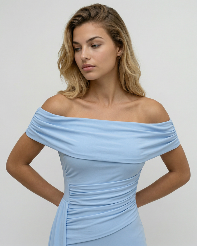 Woman wearing elegant off shoulder maxi dress