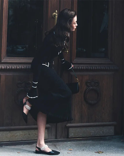 Woman wearing elegant ribbed maxi dress with timeless luxury