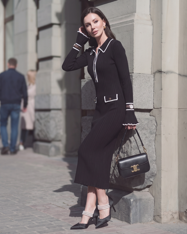 Woman wearing elegant ribbed maxi dress with timeless luxury
