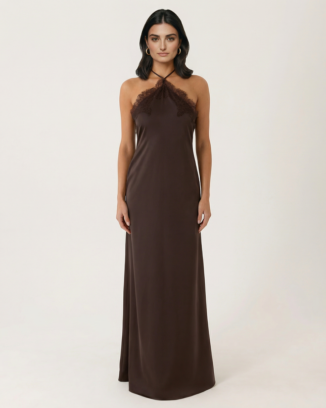 Woman wearing lace halter maxi dress