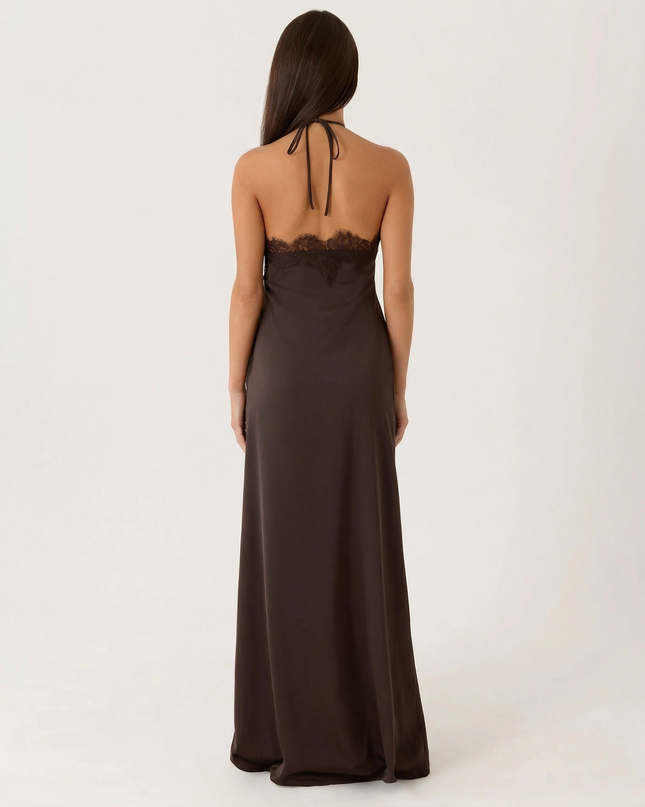 Woman wearing lace halter maxi dress