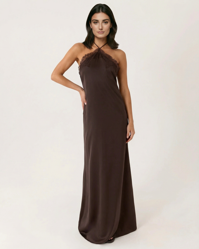 Woman wearing lace halter maxi dress