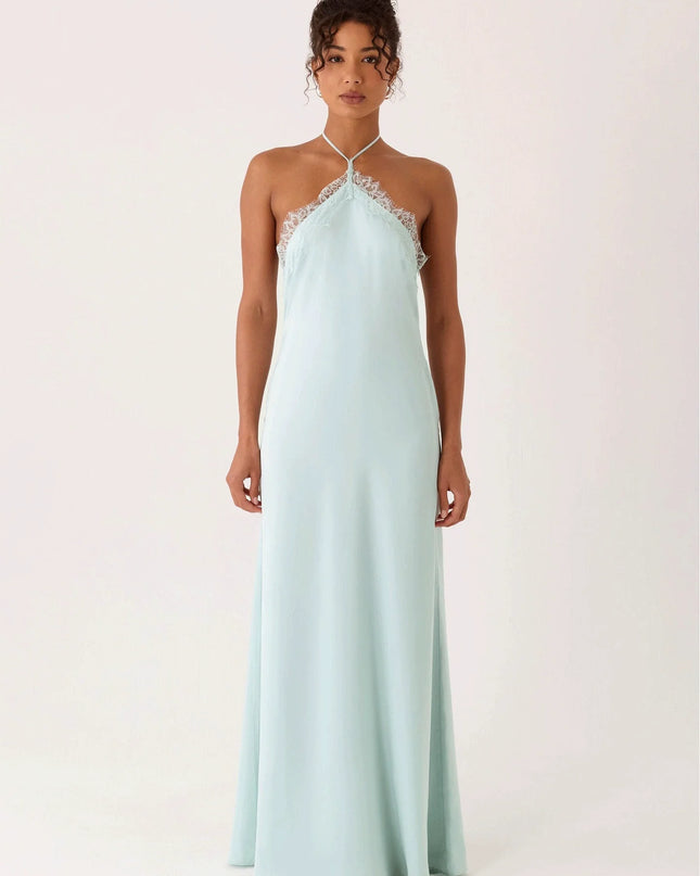 Woman wearing lace halter maxi dress