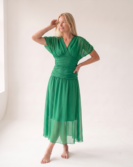 Woman wearing off shoulder maxi dress