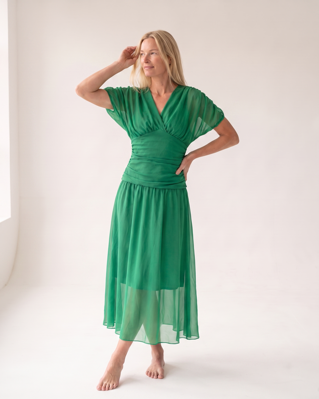 Woman wearing off shoulder maxi dress