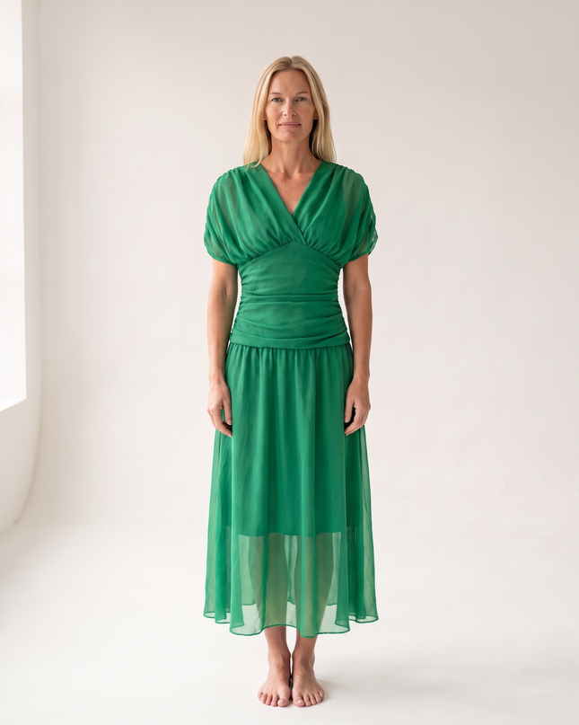 Woman wearing off shoulder maxi dress