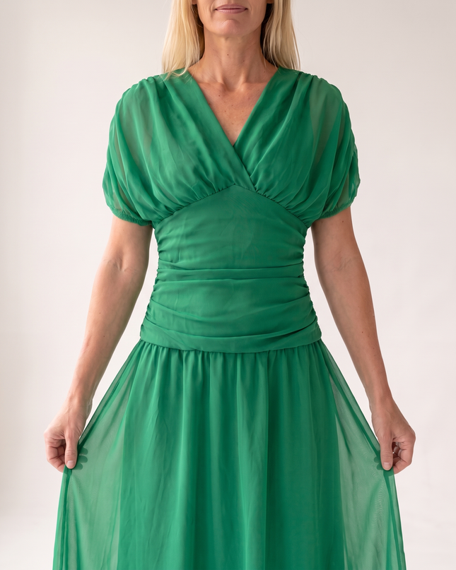 Woman wearing off shoulder maxi dress
