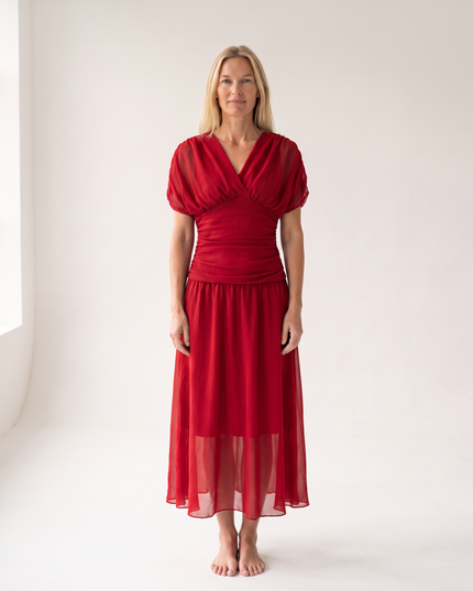Woman wearing off shoulder maxi dress