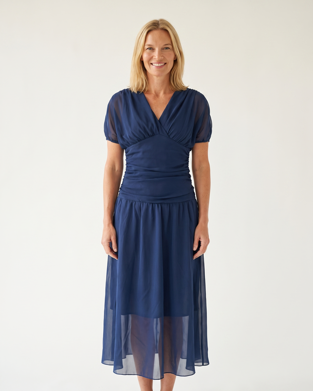 Woman wearing off shoulder maxi dress