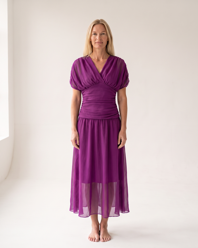 Woman wearing off shoulder maxi dress