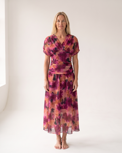 Woman wearing off shoulder maxi dress
