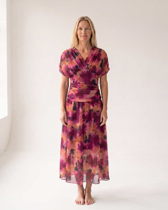 Woman wearing off shoulder maxi dress