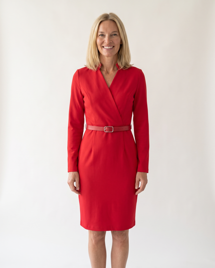 Woman wearing elegant belted midi dress