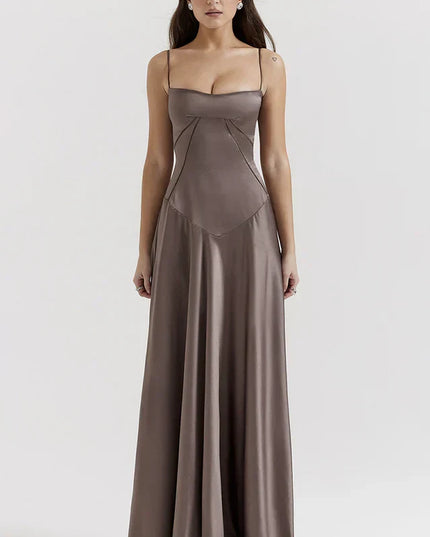 Woman wearing elegant satin maxi dress