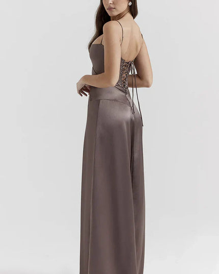 Woman wearing elegant satin maxi dress