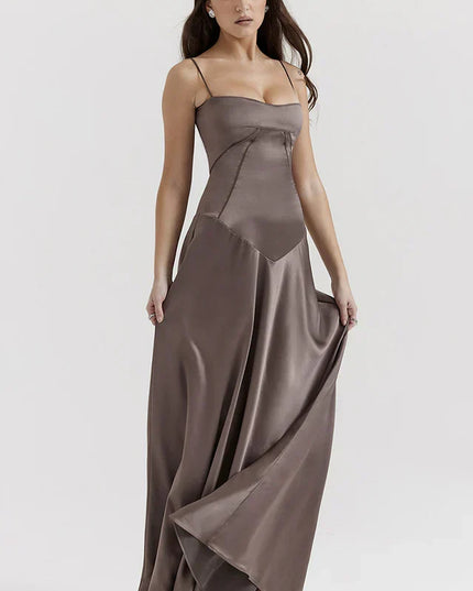 Woman wearing elegant satin maxi dress