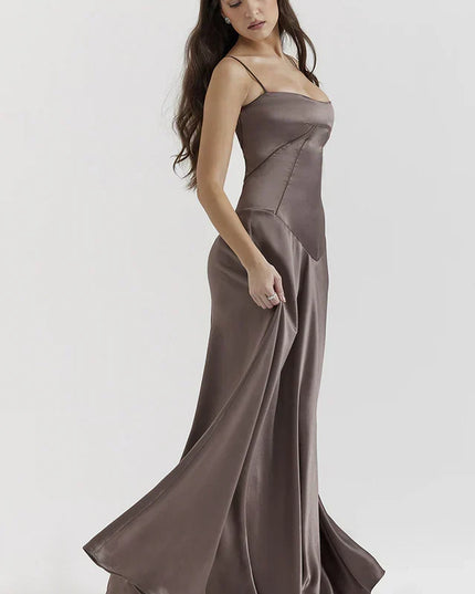 Woman wearing elegant satin maxi dress