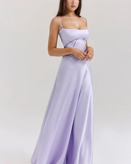 Woman wearing elegant satin maxi dress
