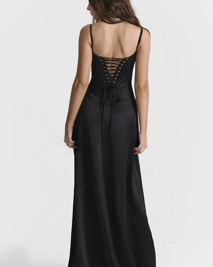 Woman wearing elegant satin maxi dress