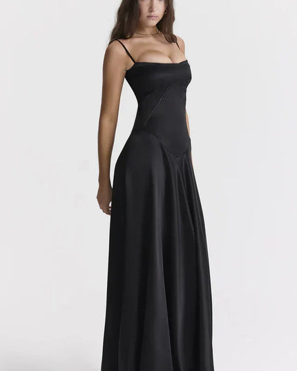 Woman wearing elegant satin maxi dress
