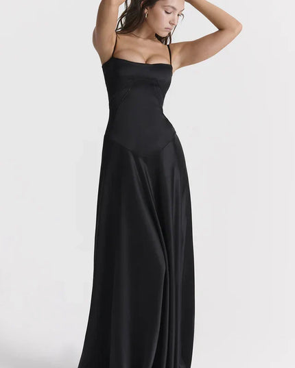 Woman wearing elegant satin maxi dress