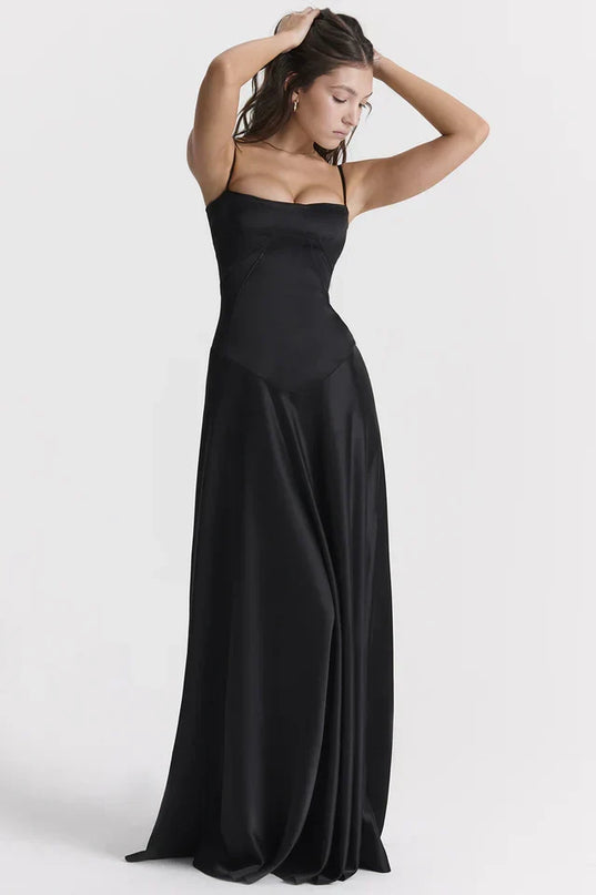 Woman wearing elegant satin maxi dress