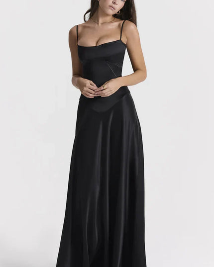 Woman wearing elegant satin maxi dress