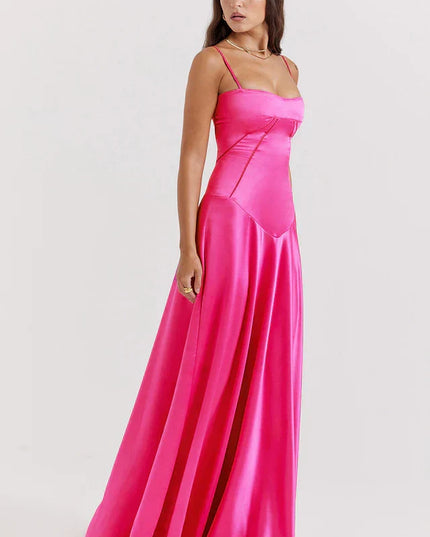 Woman wearing elegant satin maxi dress