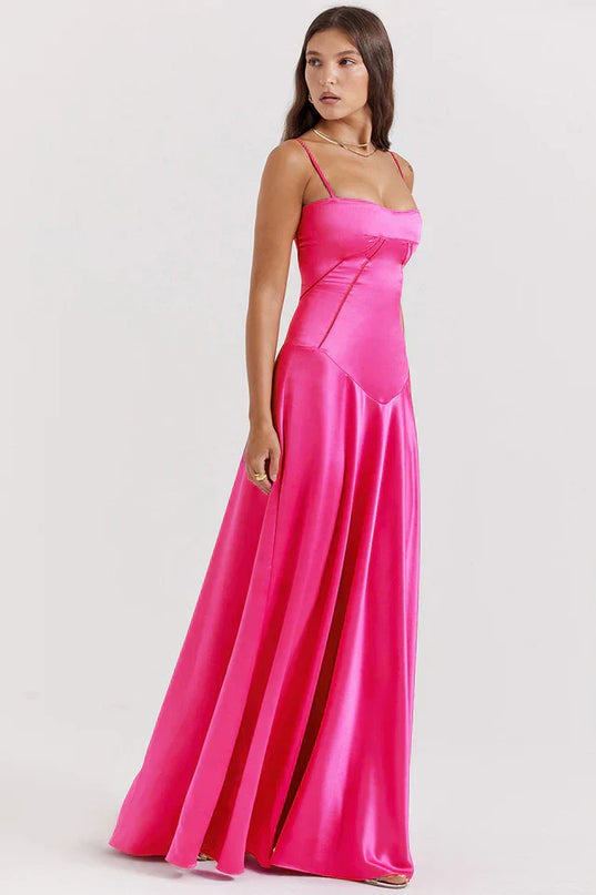 Woman wearing elegant satin maxi dress