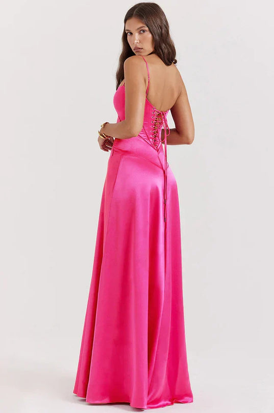 Woman wearing elegant satin maxi dress