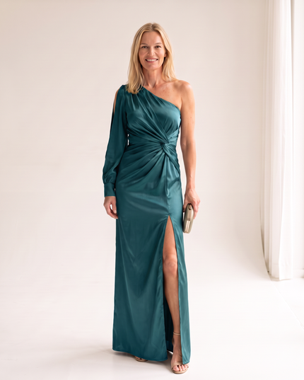 Woman wearing one shoulder satin evening dress