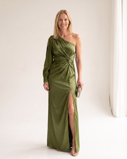 Woman wearing one shoulder satin evening dress