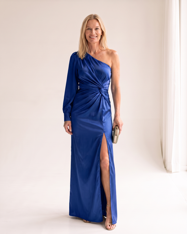 Woman wearing one shoulder satin evening dress