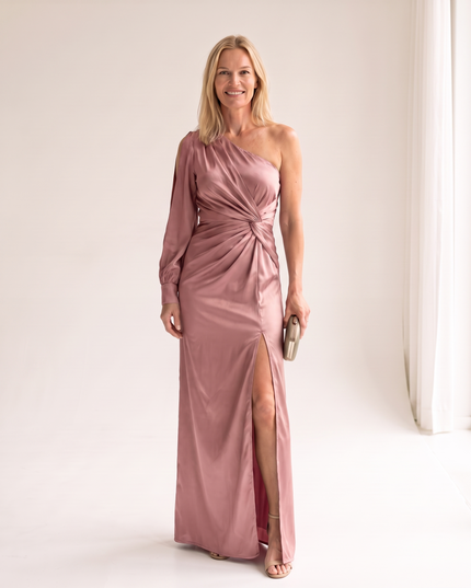 Woman wearing one shoulder satin evening dress